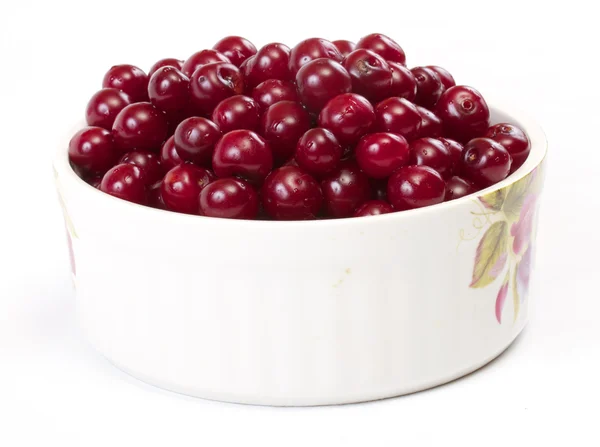 stock image Bowl with ripe cherries. Isolated on a white background.