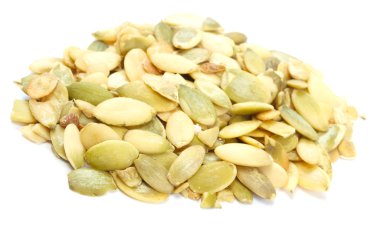 Pumpkin seeds isolated on a white clipart