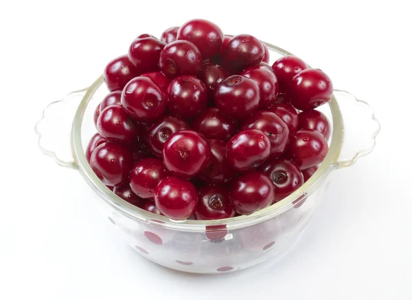 stock image Bowl with ripe cherries. Isolated on a white background.