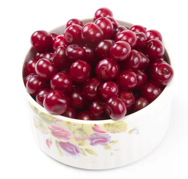 stock image Bowl with ripe cherries. Isolated on a white background.