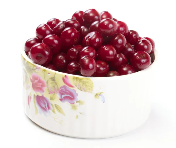 stock image Bowl with ripe cherries. Isolated on a white background.