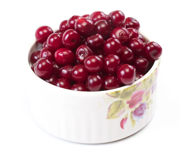 stock image Bowl with ripe cherries. Isolated on a white background.