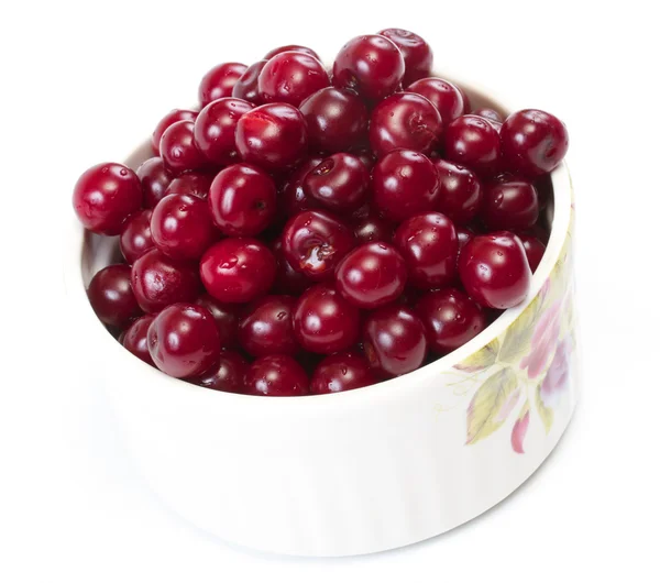 stock image Bowl with ripe cherries. Isolated on a white background.