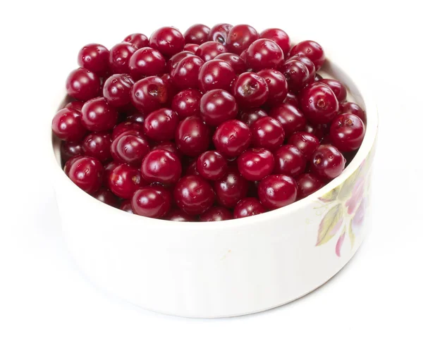 stock image Bowl with ripe cherries. Isolated on a white background.