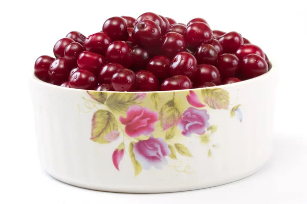 stock image Bowl with ripe cherries. Isolated on a white background.