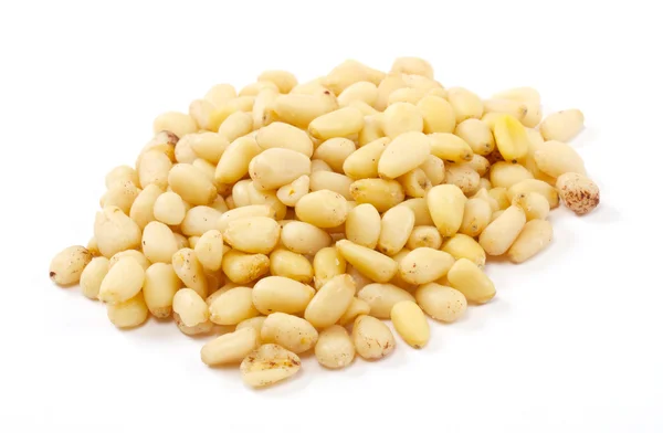 Cedar Pine nuts on a white background — Stock Photo, Image