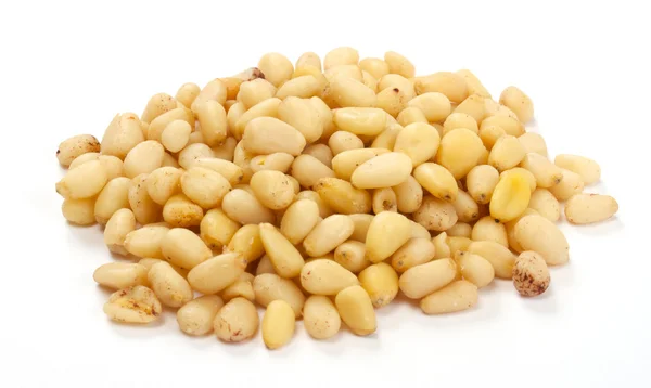 Cedar Pine nuts on a white background — Stock Photo, Image