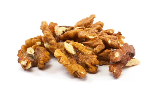 stock image Crushed walnuts on white background