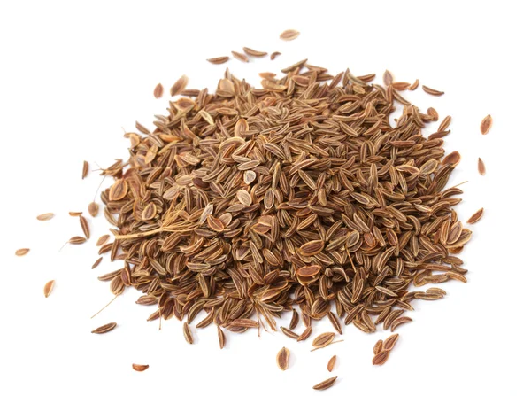 Pilha de sementes de endro no fundo branco — Fotografia de Stock