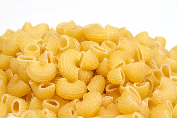 Detailní záběr sušené italské těstoviny na bílém pozadí — Stock fotografie