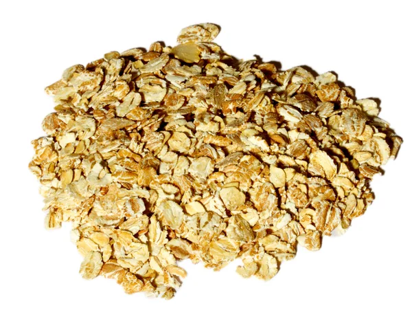 Heap of dry rolled oats isolated on white background — Stock Photo, Image