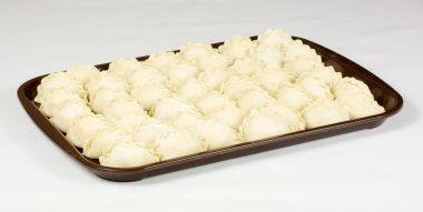 Uncooked dumplings with potato