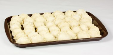 Uncooked dumplings with potato