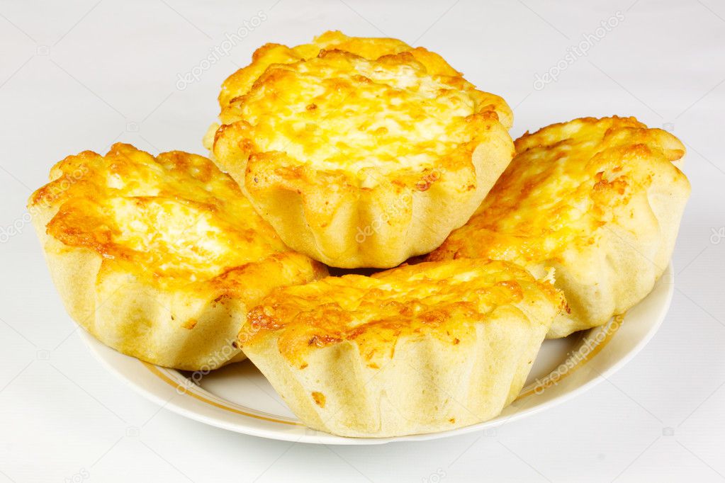 Ndividual meat pie with potato topping.