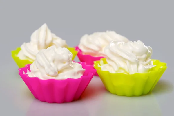 Four portions of whipped cream — Stock Photo, Image