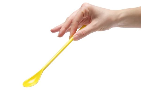 Hand holding an empty teaspoon — Stock Photo, Image