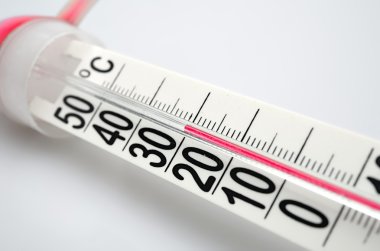 Closeup of celsius thermometer. Small DOF clipart