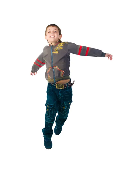 Niedlicher kleiner Junge springt — Stockfoto
