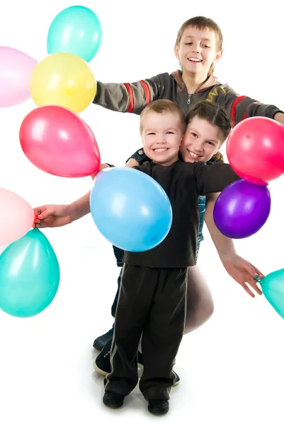 Crianças com os balões — Fotografia de Stock
