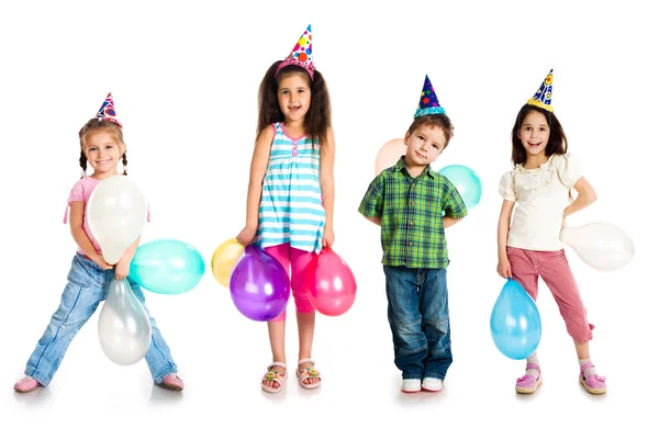 Bambini in berretti di compleanno — Foto Stock