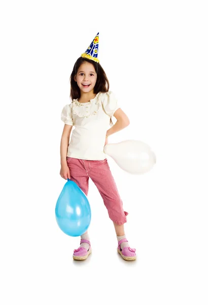 Kleines Mädchen mit Geburtstagskappe — Stockfoto