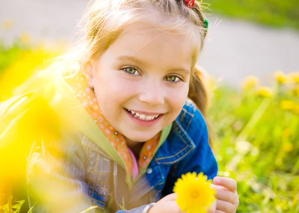 Cute little girl on the meadow — Stock Photo, Image