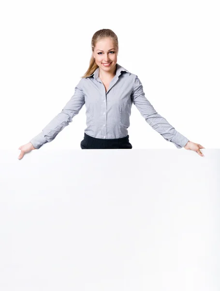 Empresária em pé atrás de branco — Fotografia de Stock