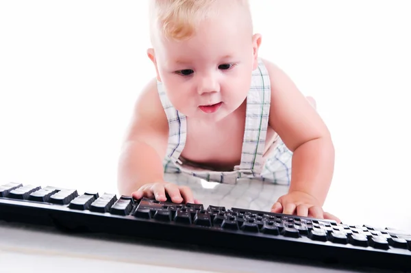 Küçük çocuk holding klavye — Stok fotoğraf