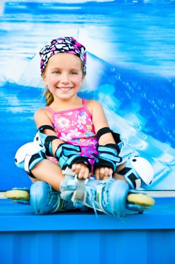 Cute girl in roller skates clipart