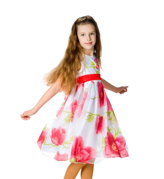 Маленька дівчинка в червоній сукні — стокове фото