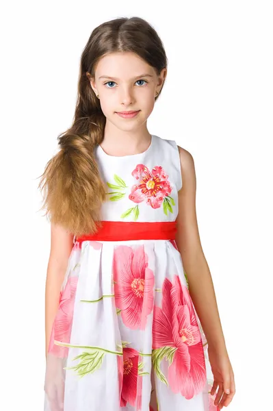 Klein meisje in een rode jurk — Stockfoto