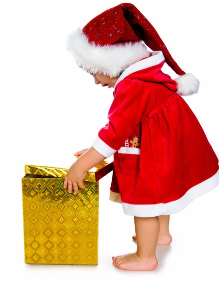 Menina em Papai Noel com presentes — Fotografia de Stock