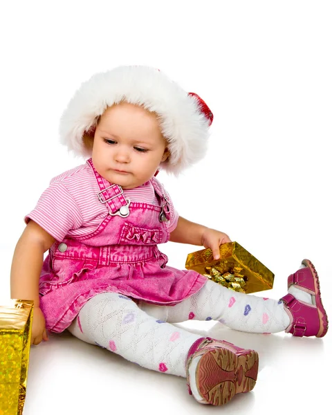 Roztomilá dívka s vánočními dárky — Stock fotografie
