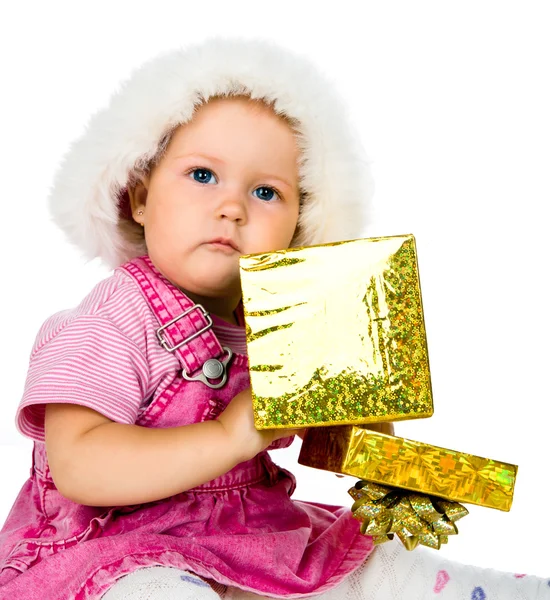 Roztomilá dívka s vánočními dárky — Stock fotografie