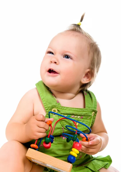 Petit bébé avec jouet de développement — Photo
