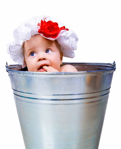 Baby on a bucket — Stock Photo, Image