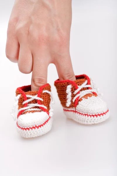 Crocheted booties for a boy — Stock Photo, Image