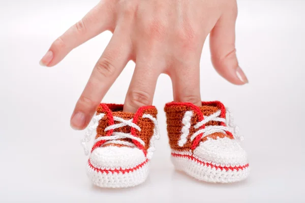 Crocheted booties for a boy — Stock Photo, Image