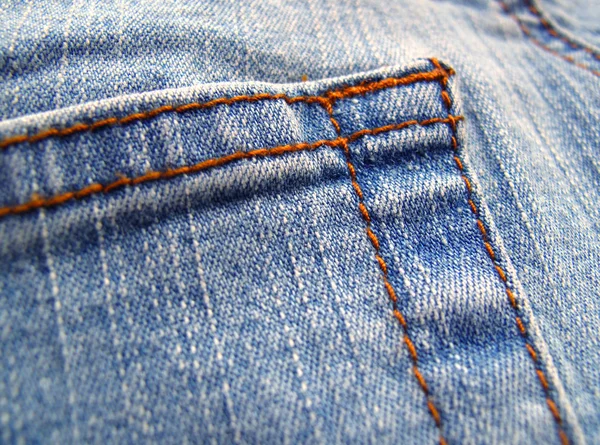 Classic blue fashioned jeans texture — Stock Photo, Image