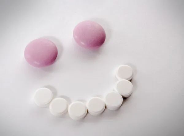 Посмішка таблетки — стокове фото