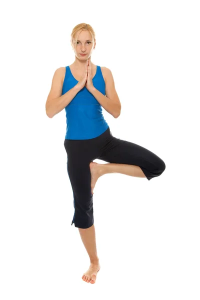 Practicing Yoga. Young woman Stock Picture