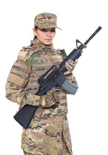 Vackra armén tjej med gevär — Stockfoto