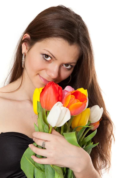 Skönhet flicka håller bukett tulpaner — Stockfoto