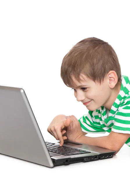 Мальчик с ноутбуком Лицензионные Стоковые Изображения
