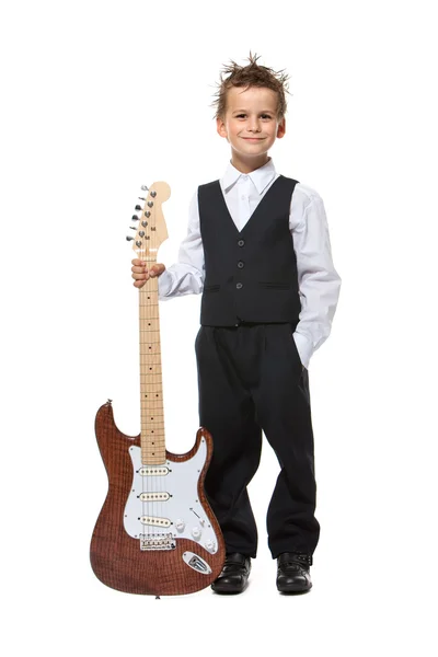 Boy holding a guitar — Stock Photo, Image
