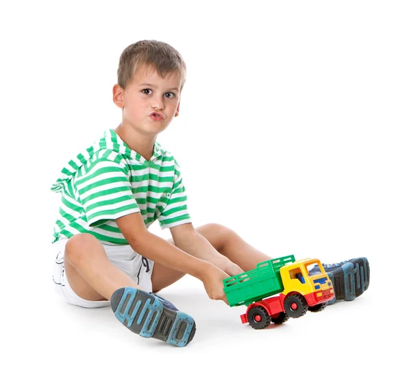 Мальчик держит машину — стоковое фото