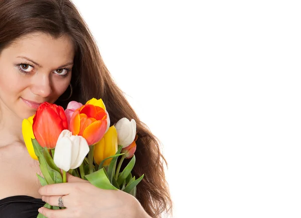 Skönhet flicka håller bukett tulpaner — Stockfoto