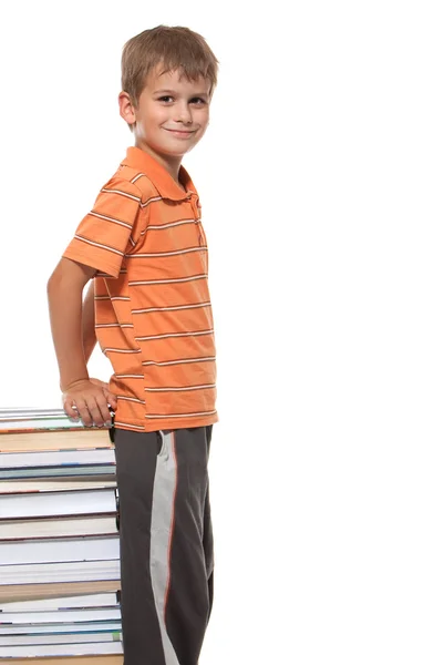 Pojke och böcker — Stockfoto