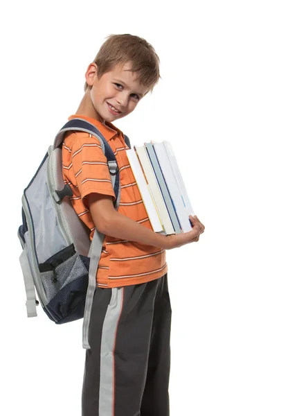 Мальчик с книгами — стоковое фото