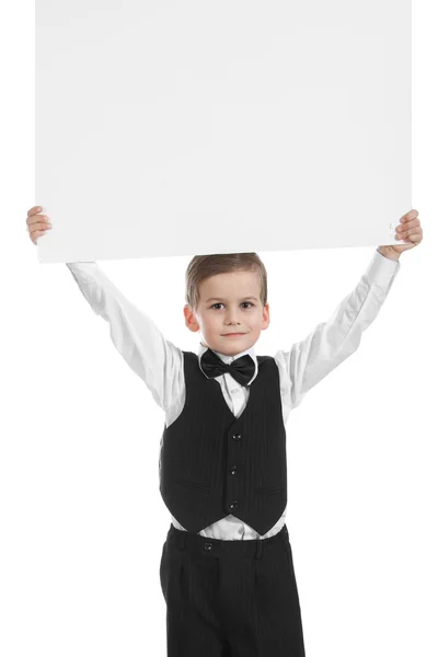 Pojken håller en banderoll — Stockfoto